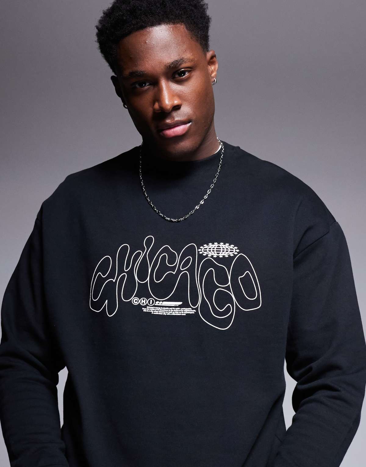 ASOS DESIGN oversized crew with city print in black