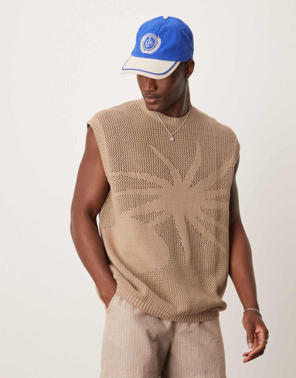 ASOS DESIGN oversized crochet knitted vest with sun embroidery in khaki