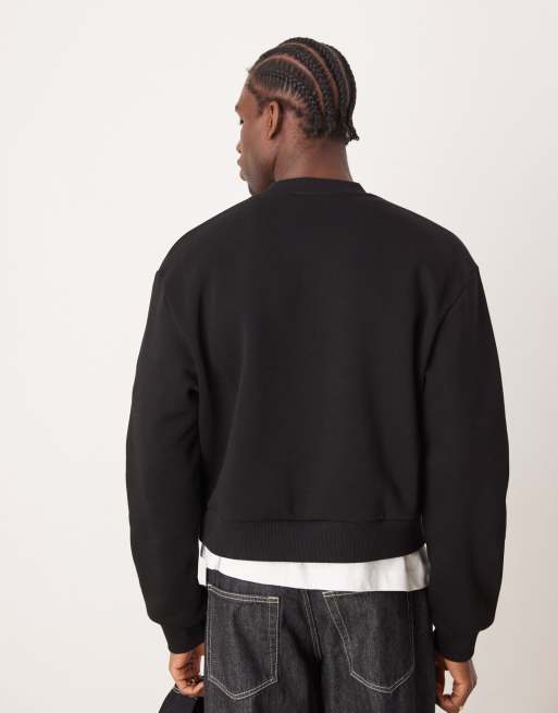 ASOS DESIGN oversized cropped sweatshirt with chest print in black