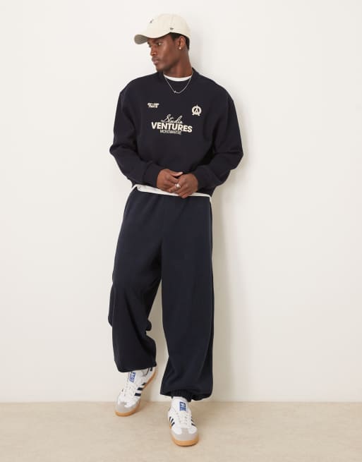 ASOS DESIGN - Felpa oversize taglio corto blu navy con stampa sul petto