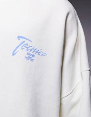 ASOS DESIGN oversized cropped sweatshirt with raw hem and chest print in white