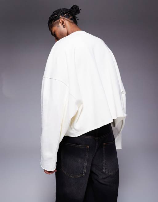 ASOS DESIGN oversized cropped sweatshirt with raw hem and chest print in white