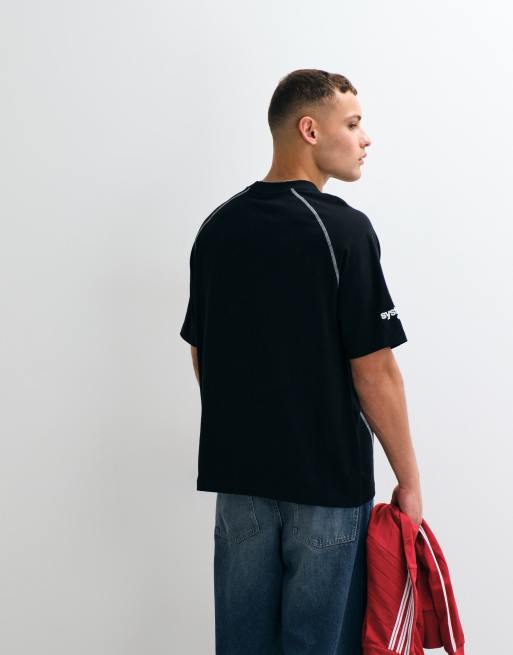 ASOS DESIGN oversized cut and sew T-shirt with soccer graphic in black, 4 of 5