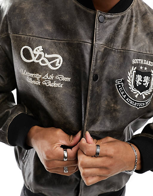ASOS DESIGN oversized distressed leather varsity jacket in black