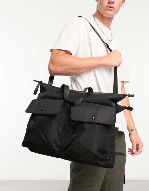 Oversized cross outlet body bag