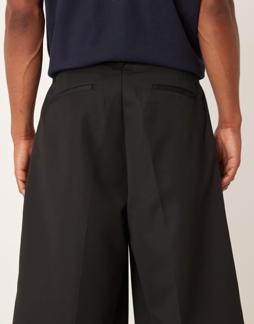 ASOS DESIGN oversized dressy bermuda shorts with front pleats in black