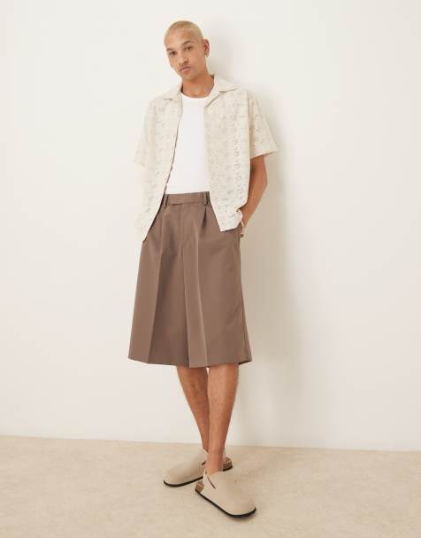 ASOS DESIGN oversized dressy bermuda shorts with front pleats in brown - view 1