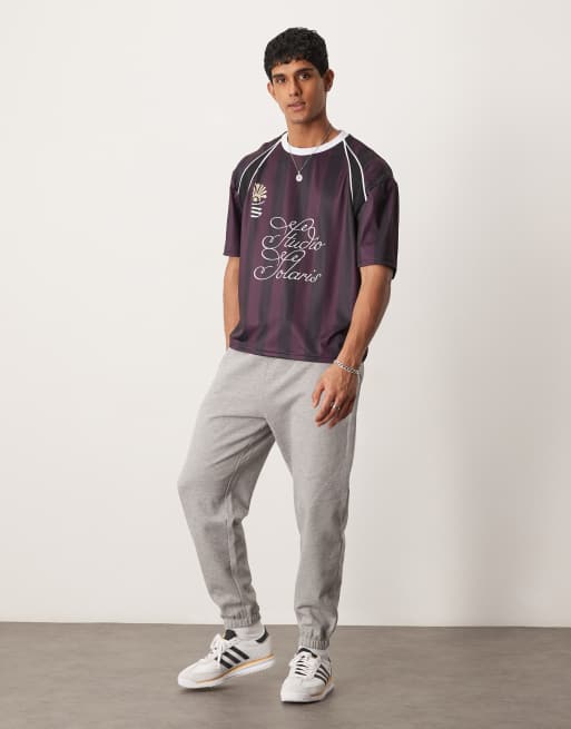 ASOS DESIGN oversize drop shoulder t-shirt with piped panels in burgundy stripe