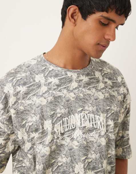 ASOS DESIGN oversized dropped shoulder t-shirt in camo print - view 1