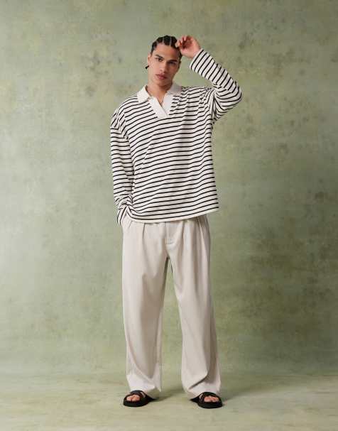 ASOS DESIGN oversized dropped shoulders polo shirt in black and white textured stripe - view 1