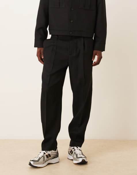 ASOS DESIGN - Oversized Elegante toelopende broek met 1/4 elastische taille in zwart, deel van co-ord set - view 1