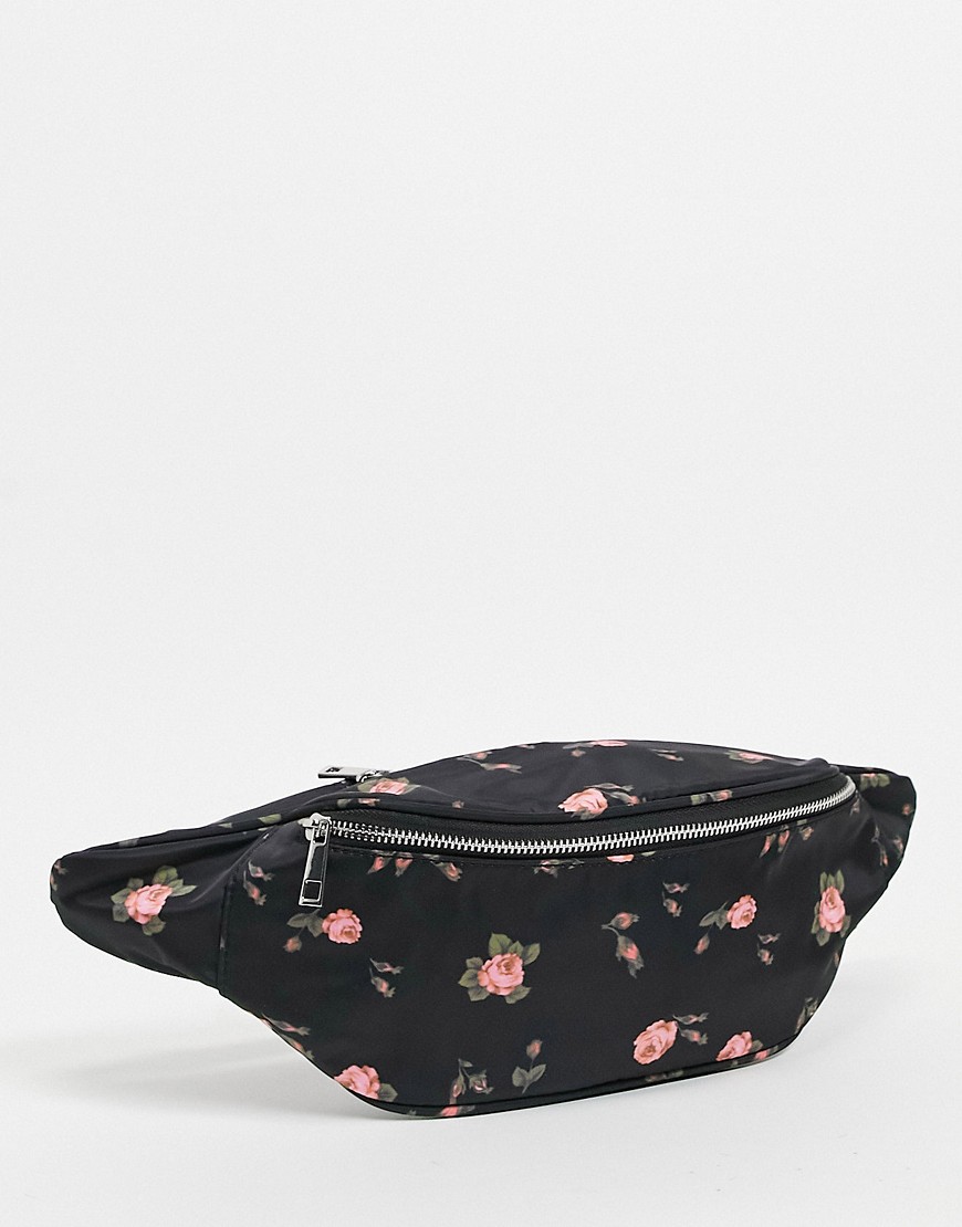ASOS DESIGN oversized fanny pack in flirty floral print-Multi