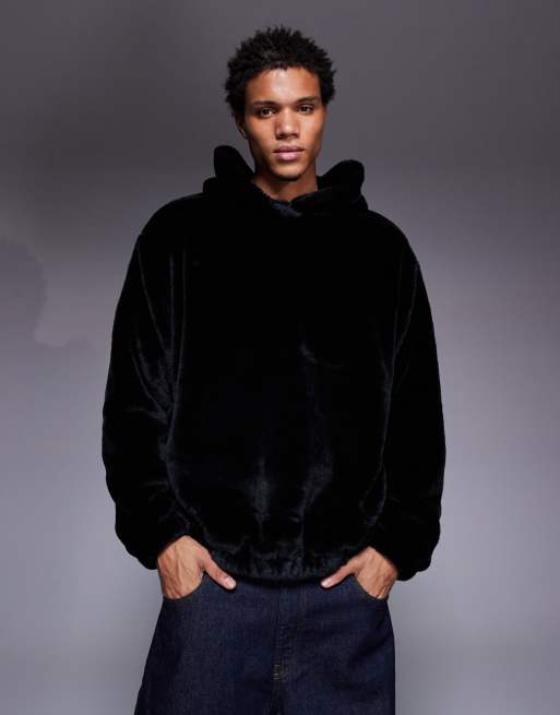 ASOS DESIGN oversized faux fur hoodie with side entry pockets in black