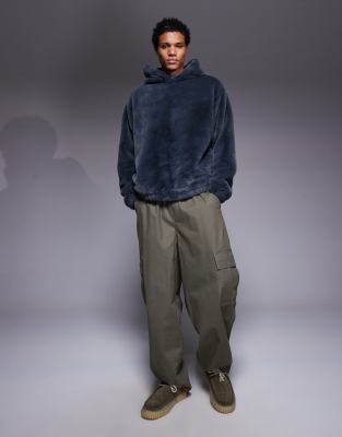 Asos Design Oversized Faux Fur Hoodie With Side Entry Pockets In Blue