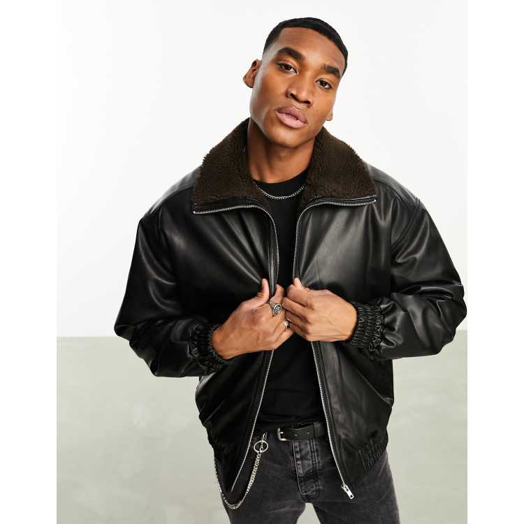 ASOS DESIGN oversized faux leather bomber jacket in brown with borg lining