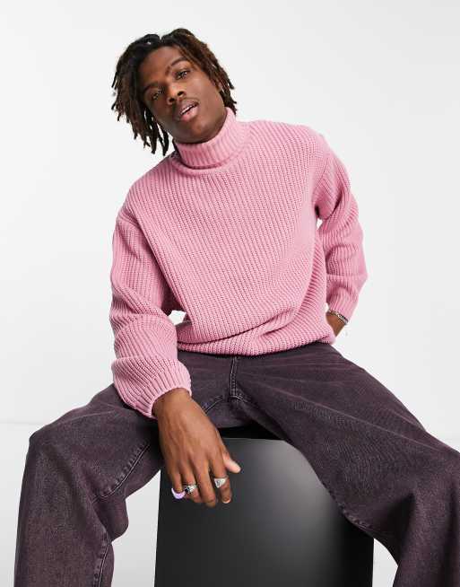 ASOS DESIGN oversized fisherman rib roll neck sweater in pink twist