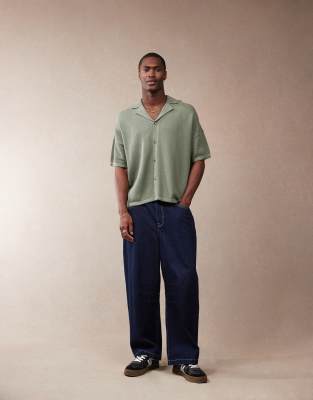 ASOS DESIGN oversized boxy fit knitted texture revere neck button through polo in green