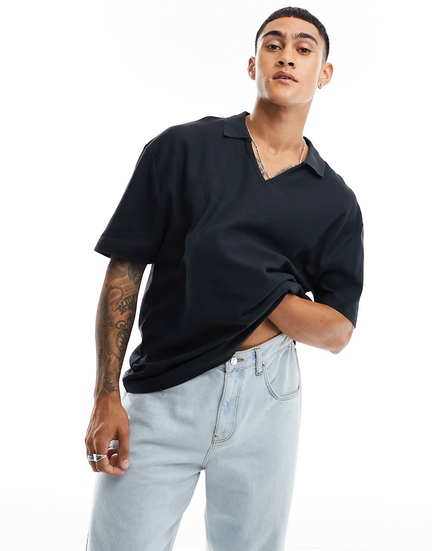 ASOS DESIGN oversized fit waffle polo in black