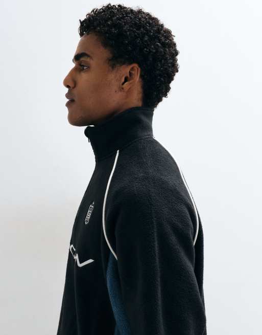ASOS DESIGN oversized fleece med kvart lynlås, cut-and-sew-paneler og paspel i sort, 3 af 5