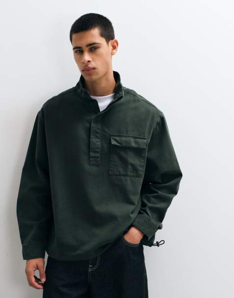 ASOS DESIGN oversized funnel neck cotton twill shirt in dark green - view 1