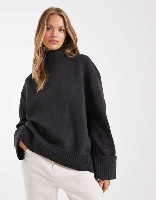 ASOS DESIGN oversized funnel neck jumper with curved hem in navy