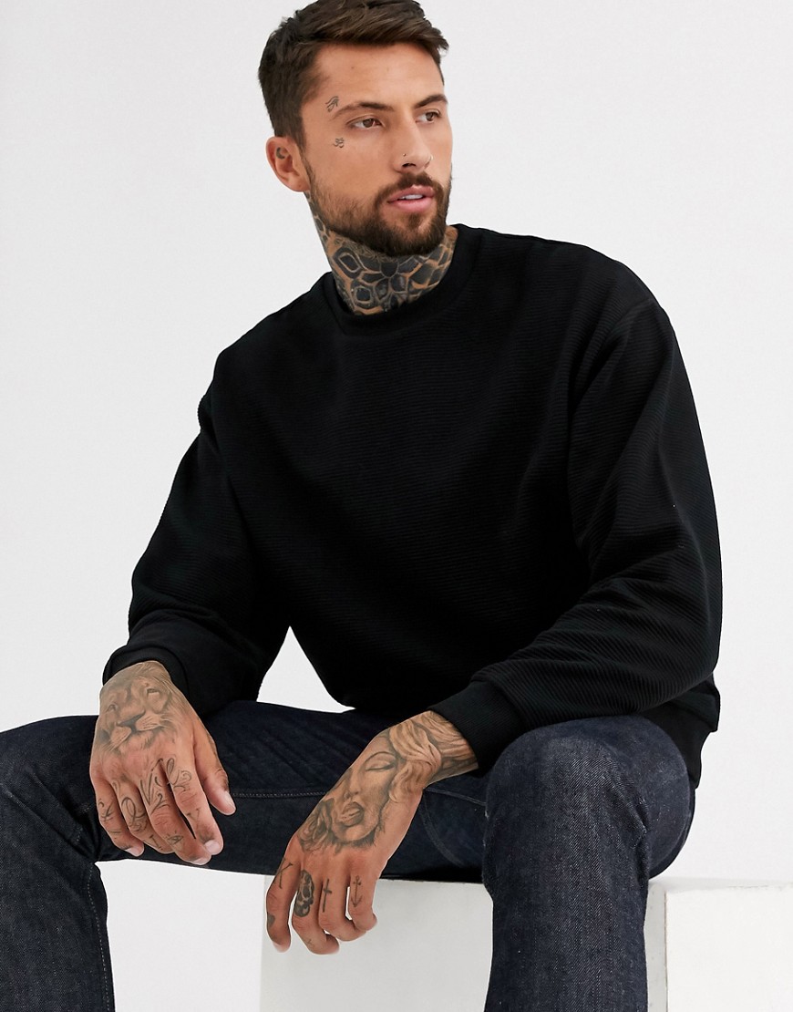 ASOS DESIGN - Oversized geribbeld sweatshirt in zwart
