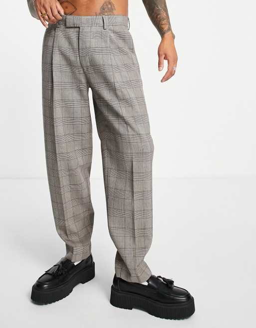 ASOS DESIGN - Oversized geruite toelopende broek in bruin