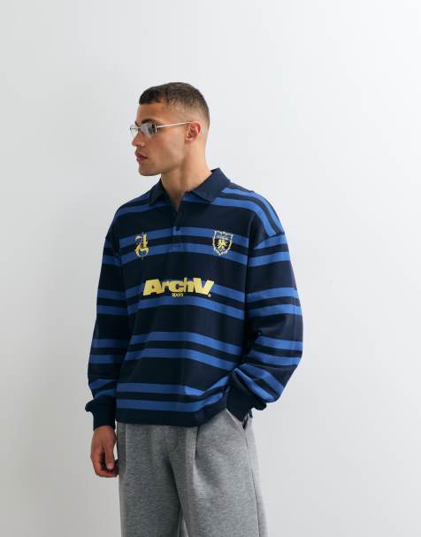 ASOS DESIGN - Oversized gestreept rugbysweatshirt met grafische print in marineblauw - view 1