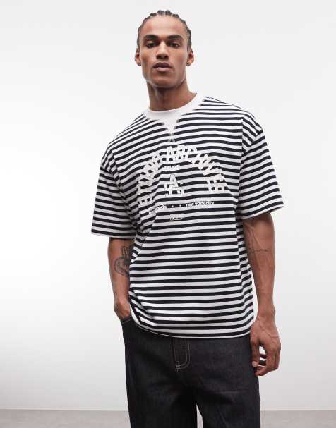 ASOS DESIGN - Oversized gestreept T-shirt met bolle tekstprint in marineblauw - view 1