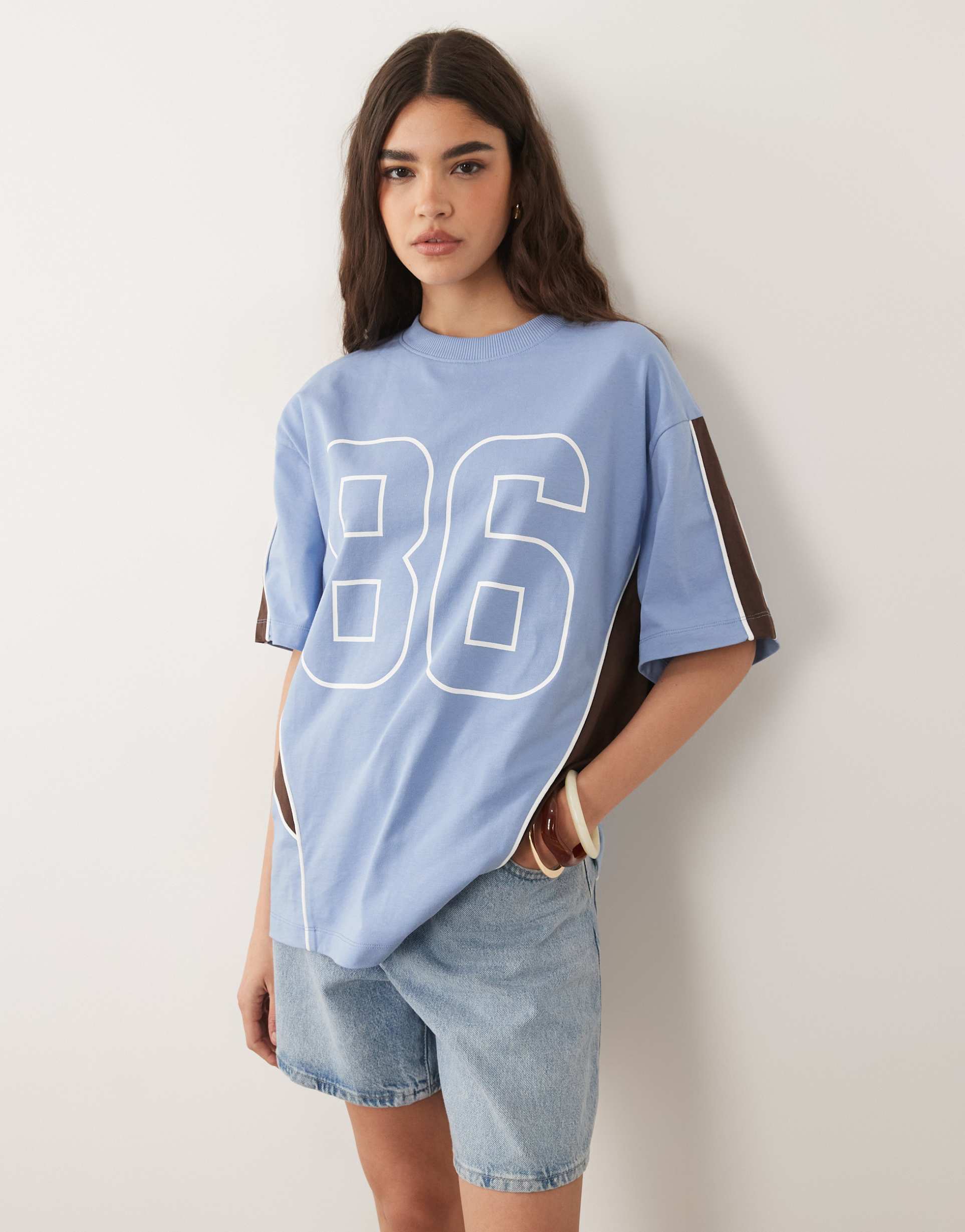 asos design oversized graphic football tee in light blue