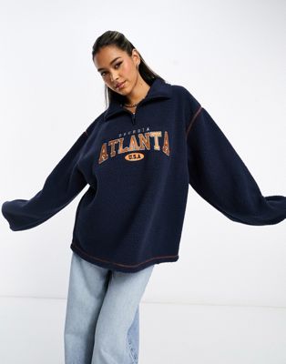 ASOS DESIGN oversized half zip borg fleece with Atlanta embroidery