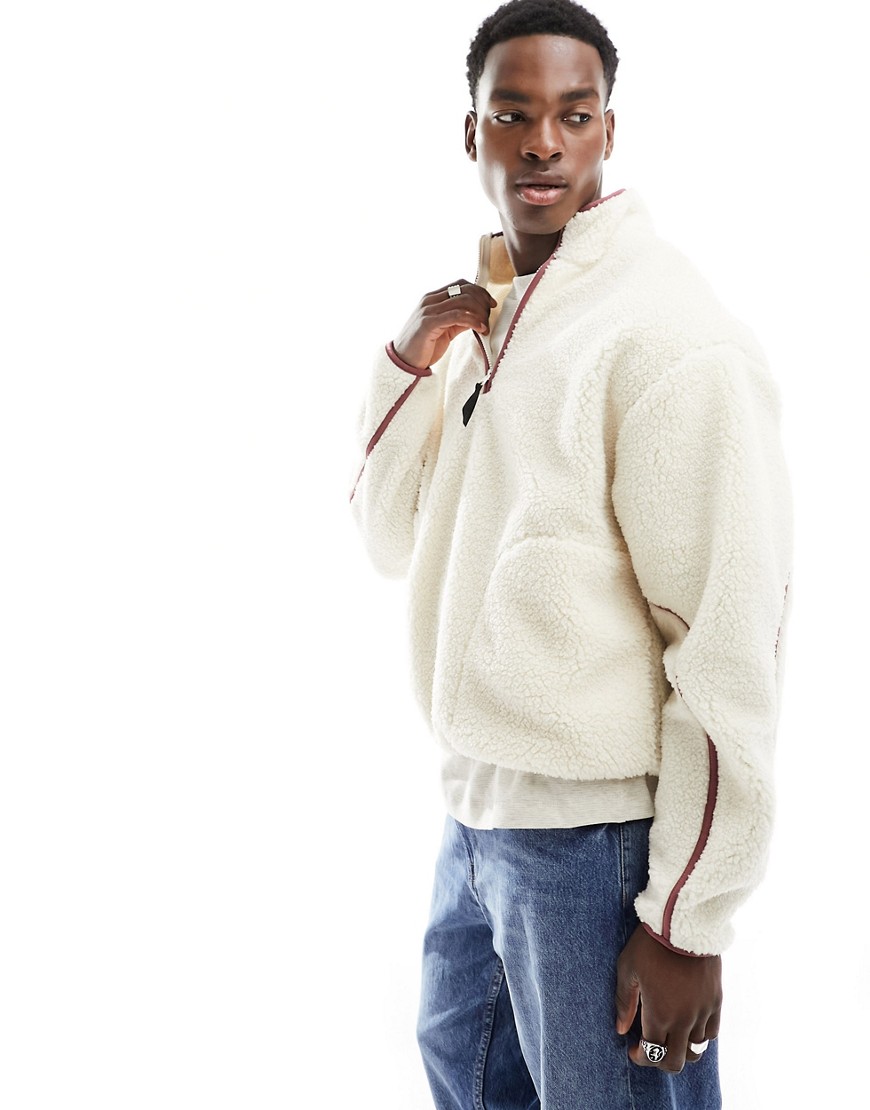 ASOS DESIGN oversized half zip borg sweatshirt in ecru with pink piping detail-White
