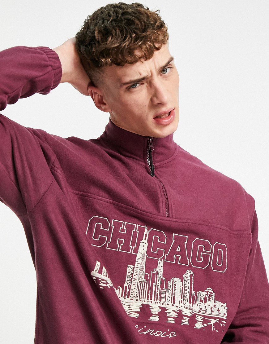 ASOS DESIGN oversized half zip fleece with Chicago front embroidery-Red