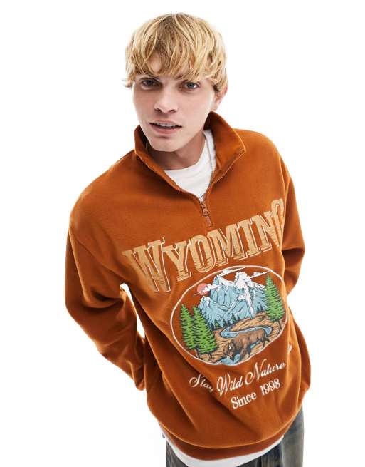 ASOS DESIGN oversized half zip sweat with front print in brown polar fleece