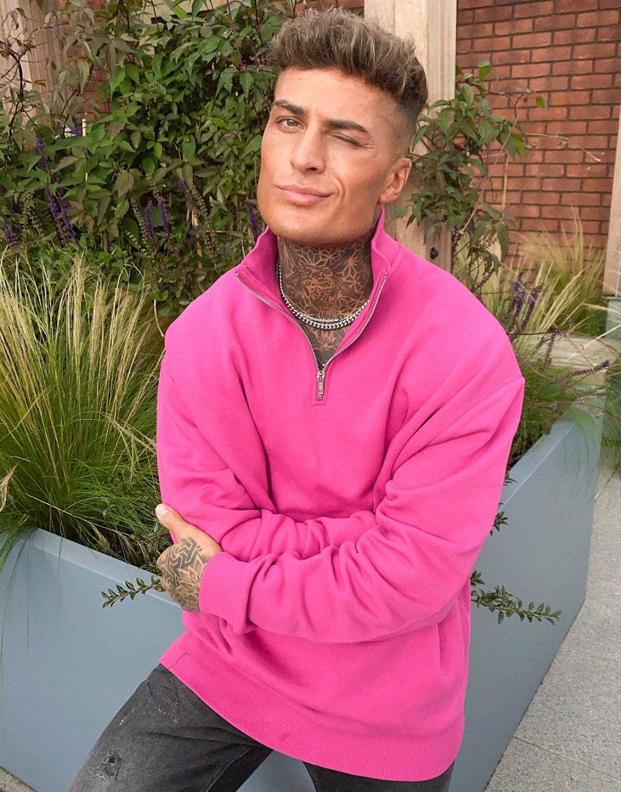 ASOS DESIGN oversized half zip sweatshirt in bright pink