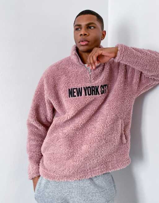 ASOS DESIGN oversized half zip sweatshirt in dusty pink teddy borg with NYC embroidery