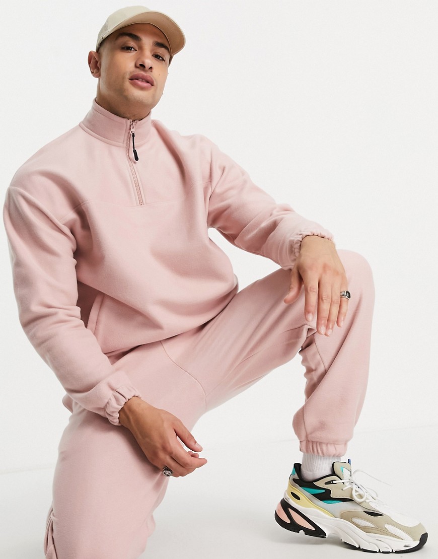 ASOS DESIGN oversized half zip sweatshirt in pink fleece - part of a set