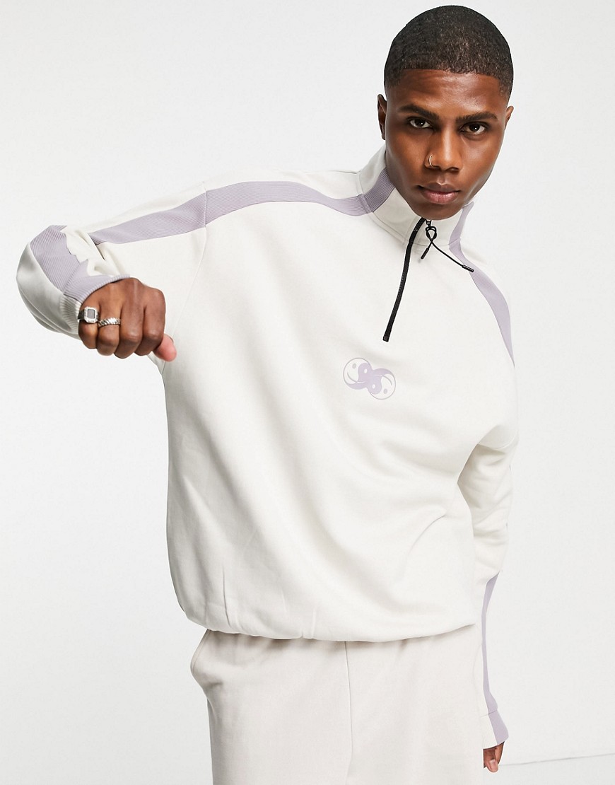 ASOS DESIGN oversized half zip sweatshirt in purple color block with chest print-Neutral
