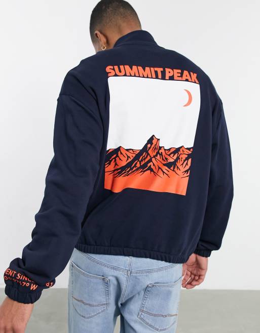 ASOS DESIGN oversized half zip sweatshirt with mountain back graphic