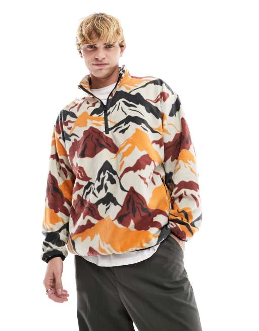 ASOS DESIGN oversized half zip sweatshirt with neutral mountain scene all over print in polar fleece