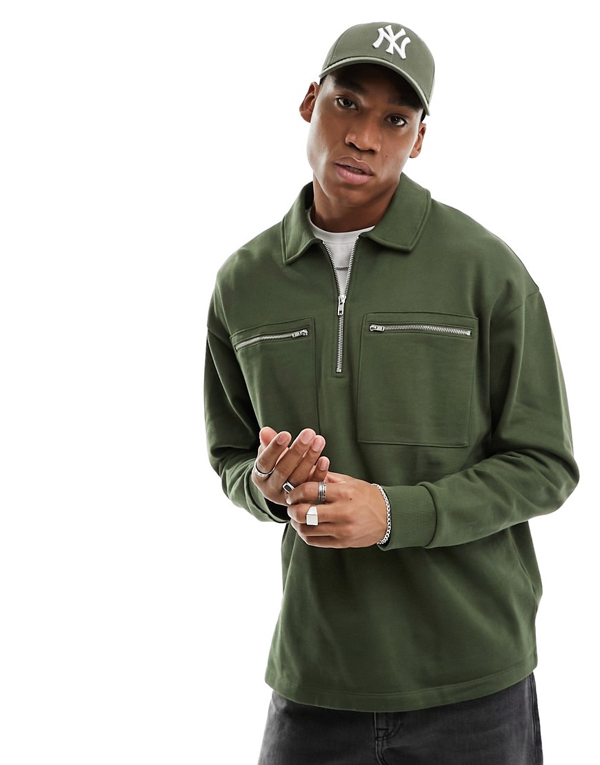 ASOS DESIGN oversized half zip sweatshirt with pockets in dark green
