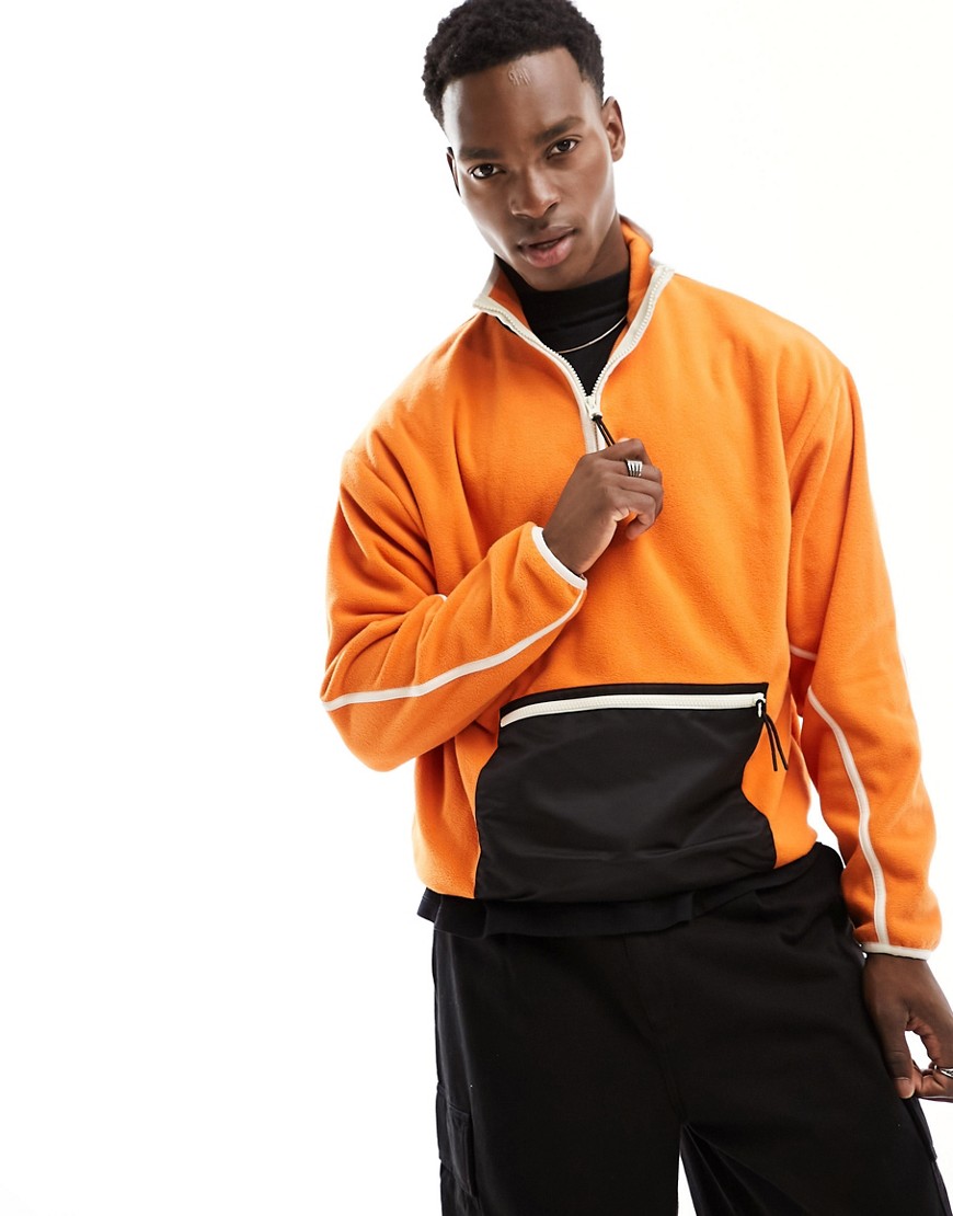 ASOS DESIGN oversized half zip sweatshirt with seam detail in orange polar fleece