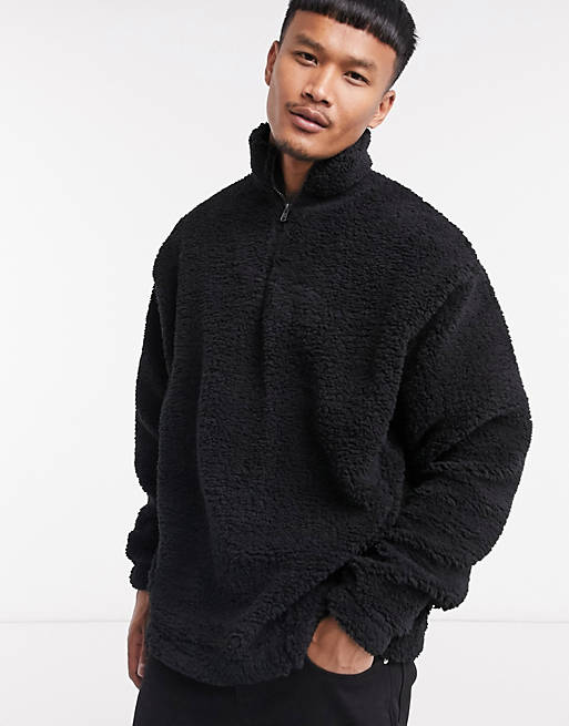 ASOS DESIGN oversized half zip track neck sweatshirt in black teddy borg