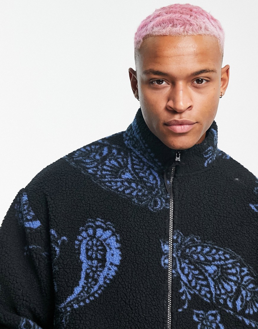 ASOS DESIGN oversized halfzip sweatshirt in blue and black sherpa with paisley print-Multi