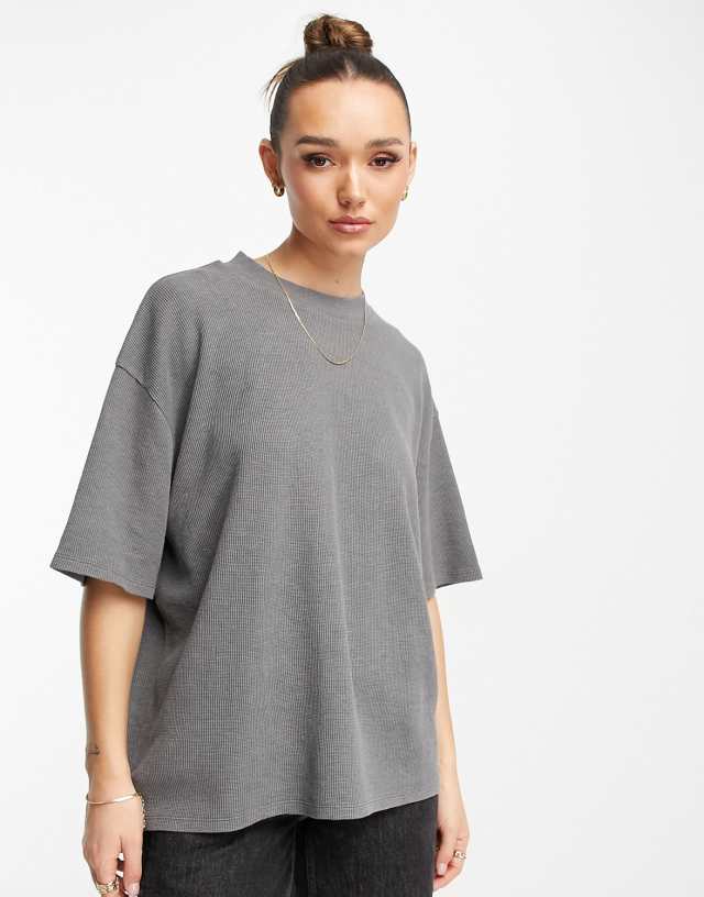 ASOS DESIGN oversized heavy weight T-shirt with side slits in waffle in washed black