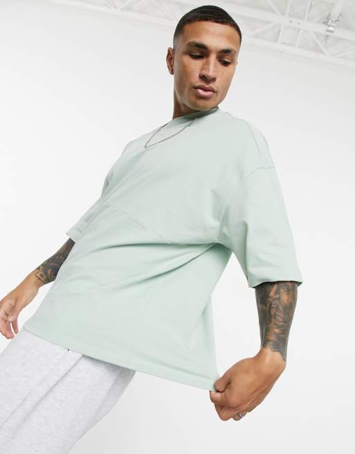 ASOS DESIGN oversized heavyweight brushed cut &sew t-shirt with chunky rib neck in green