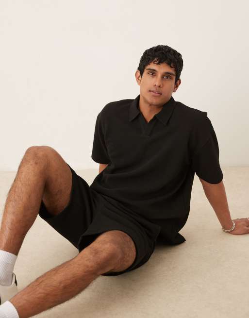 ASOS DESIGN - Oversized polo van zware stof met textuur in zwart, deel van co-ord set