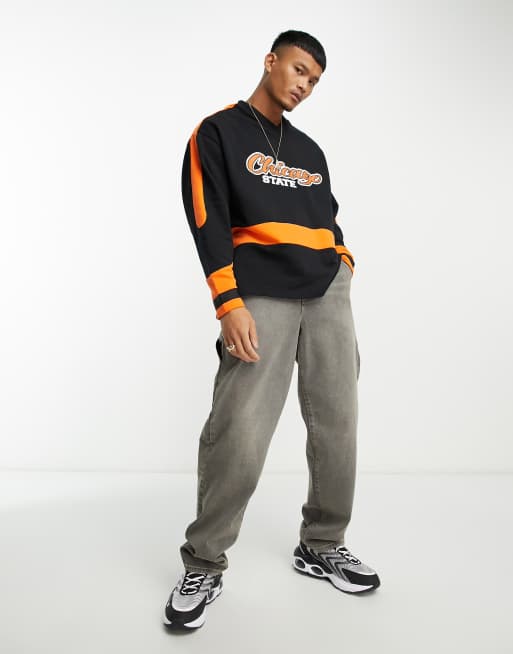 ASOS DESIGN oversized hockey jersey with city print in black and orange