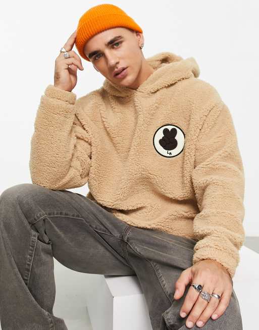 ASOS DESIGN oversized hoodie in beige borg with embroidered badge