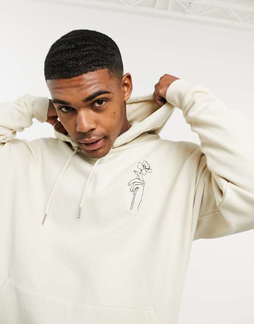 ASOS DESIGN oversized hoodie in beige with flower chest embroidery